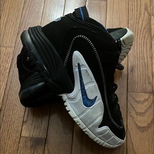 Nike Black and Blue Sneakers with Retro Design